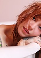 Татуированная рыжуха принимает ванну 40 фото Татуированная рыжуха принимает ванну 40 фото