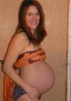 Беременная демонстрирует свой живот и сиськи 20 фото Беременная демонстрирует свой живот и сиськи 20 фото